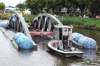 Moving bridge over water